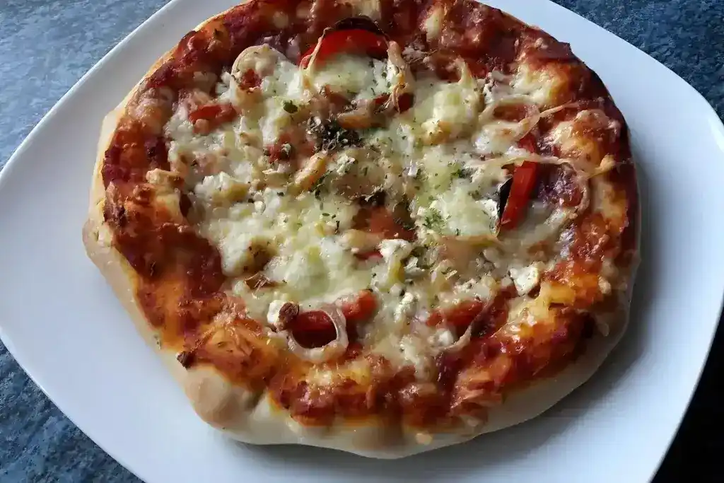 Pan Pizza mit Käse-Rand