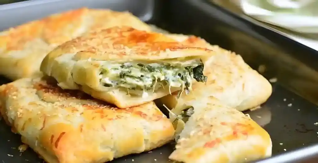 Blatterteig dreiecke mit spinat und feta