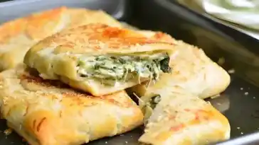 Blatterteig dreiecke mit spinat und feta