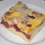 Kirsch – Pfirsich – Blechkuchen mit Amarettini – Schmandguss
