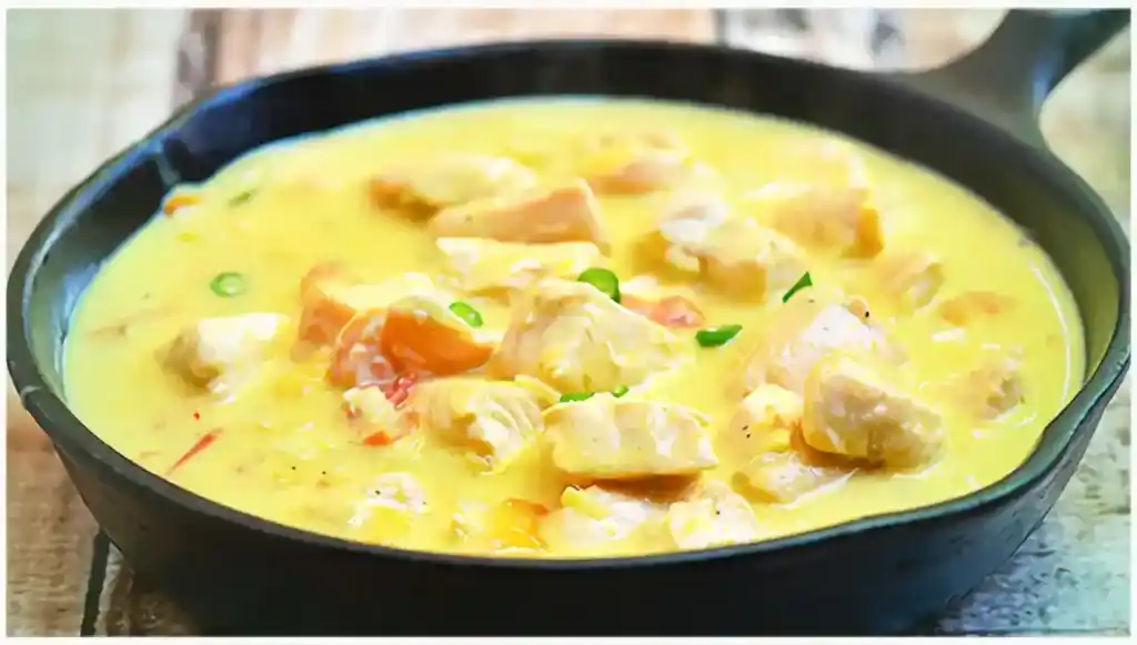 Fisch mit Shrimps, Mango, Erbsen in Kokos-Curry Soße