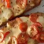 Baguettscheiben mit Tomaten & Mozzarella überbacken