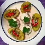 Illes leicht gefüllte Champignonköpfe auf Ofenkartoffeln