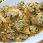 Hähnchen mit Senf und Pilzen