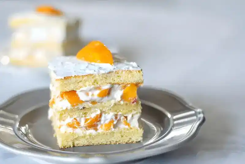 Pfirsich-Schmand-Blechkuchen Schnelles Rezept