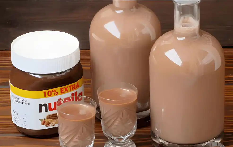 Ich verühre 0,8 Liter Rum mit 450 g Nutella für den Likör