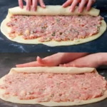 Eingerollter Teig mit 600 g Hackfleisch fuer 10 Minuten im Backofen fertiggebacken W2xEX 2.5x