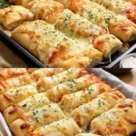 Käsestangen mit Knoblauch und Petersilie
