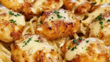 Spaghetti mit 500 g Hähnchenfleisch in Parmesan Knoblauchsauce