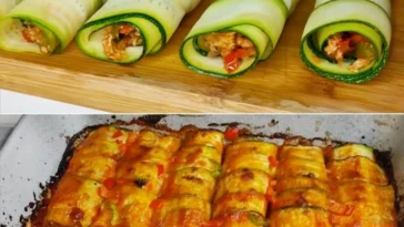 Himmlische Zucchini Rollen gefüllt mit schmackhaften Zutaten auf einem Teller