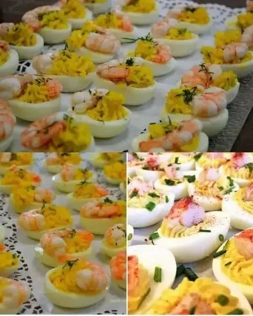 Mimosa-Eier mit Garnelen 4 Mimosa-Eier mit Garnelen elegant präsentiert auf einem Teller