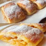 Mini weiche Kuchen mit Äpfeln 3 Mini weiche Kuchen mit Äpfeln auf einem Teller serviert