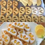 Pfirsichmarmeladenkekse mit fruchtigem Puderzuckergeschmack 3 Pfirsichmarmeladenkekse mit fruchtigem Puderzuckergeschmack auf einem Teller