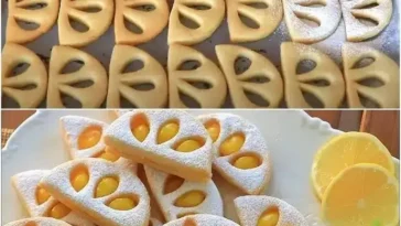 Pfirsichmarmeladenkekse mit fruchtigem Puderzuckergeschmack auf einem Teller