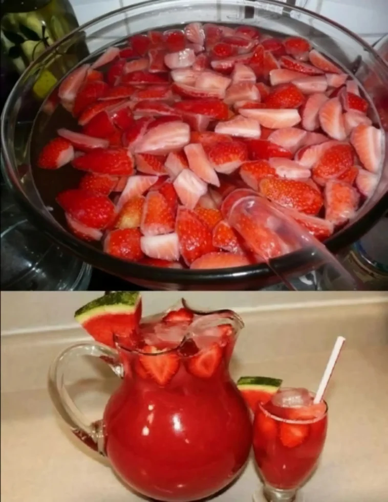 Sommerliche Erdbeer-Bowle mit Melone 1 Sommerliche Erdbeer-Bowle mit frischen Erdbeeren und Melone serviert in einer Glaskaraffe
