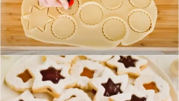 Spitzbuben Plätzchen mit Joghurt und Zitrone auf einem weißen Teller