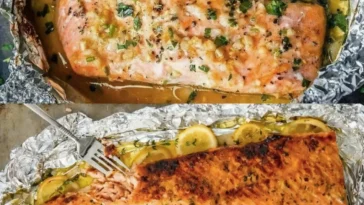Lachsfilet in Knoblauch-Zitronen-Butter zubereitet mit frischen Zutaten