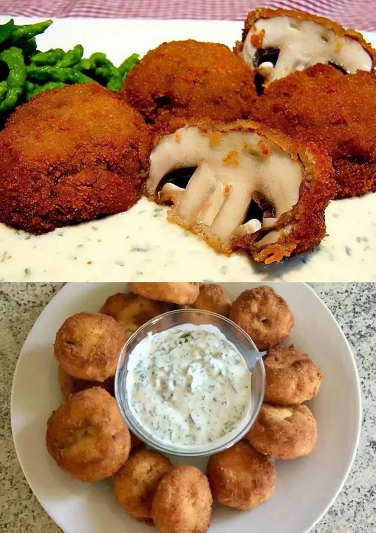 Panierte Champignons und Kräuterquark 5 Panierte Champignons mit frischem Kräuterquark auf einem Teller serviert