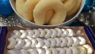 Leckere Sahnekipferl mit Kokos, schön angerichtet auf einem Teller.