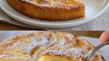 Apfelkuchen mit Vanillepudding auf einem Teller serviert