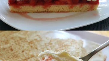 Fantakuchen mit Erdbeeren auf einem Teller serviert