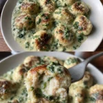 Hähnchen-Ricotta-Frikadellen mit Spinat-Sauce auf dem Teller serviert