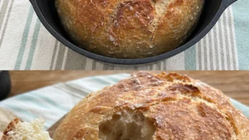 Frisch gebackenes Hausbrot auf einem Holzbrett