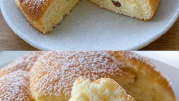 Ein köstlicher Wolkenkuchen mit Sahne und Früchten dekoriert
